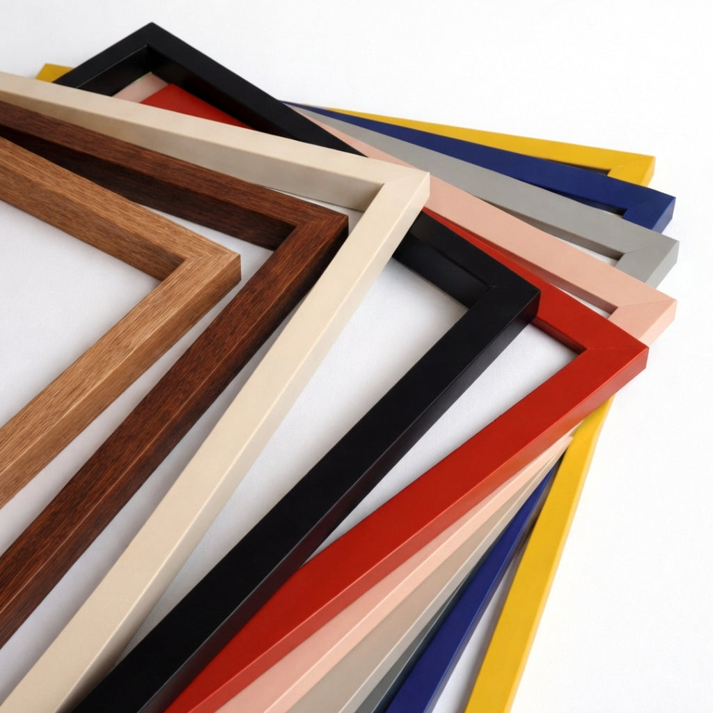 Collection of various colored picture frames on a white background - Bromont Media