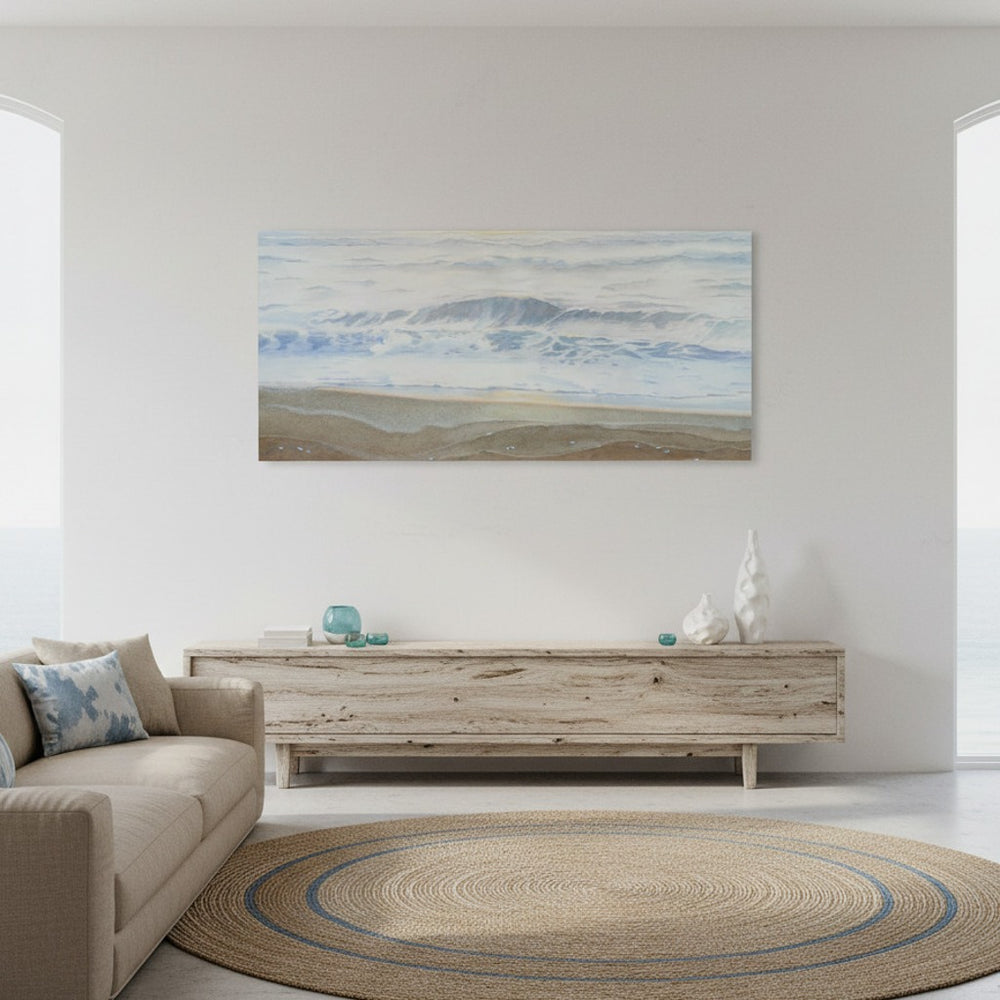 Living room with a beige sofa, wooden coffee table, and a large watercolor painting on the wall.