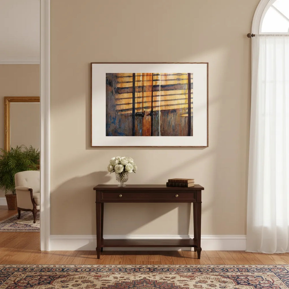 Framed abstract painting on a wall above a wooden console table with a vase of flowers - Studio Shefford