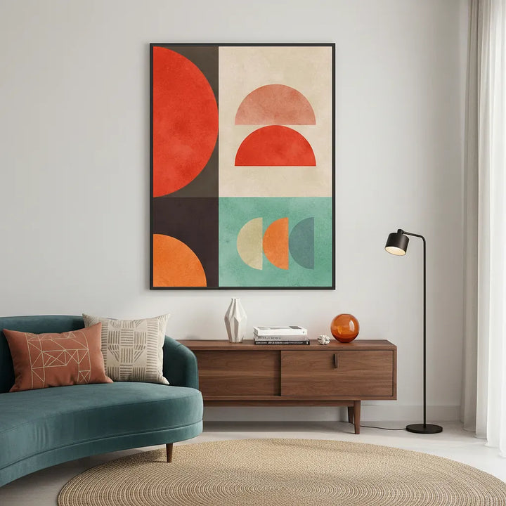 Modern living room with a teal sofa, wooden side table, and abstract wall art.