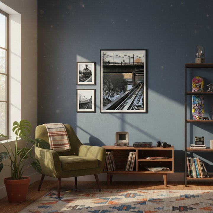 Teenage boy's room with armchair, bookshelf and framed photography of train tracks on the wall - by Andrew Semple on Bromont Media