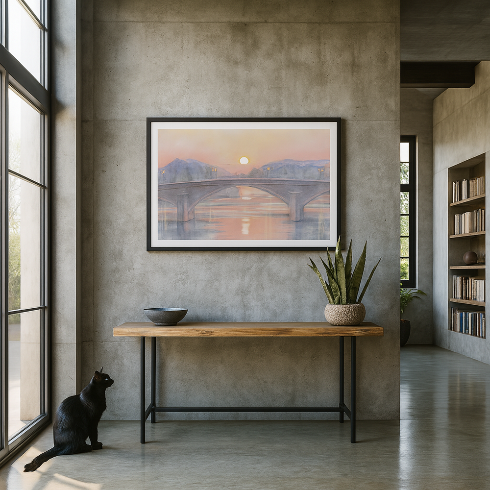 Modern concrete interior with a painting of a bridge, a plant, a wooden console, and a black cat.