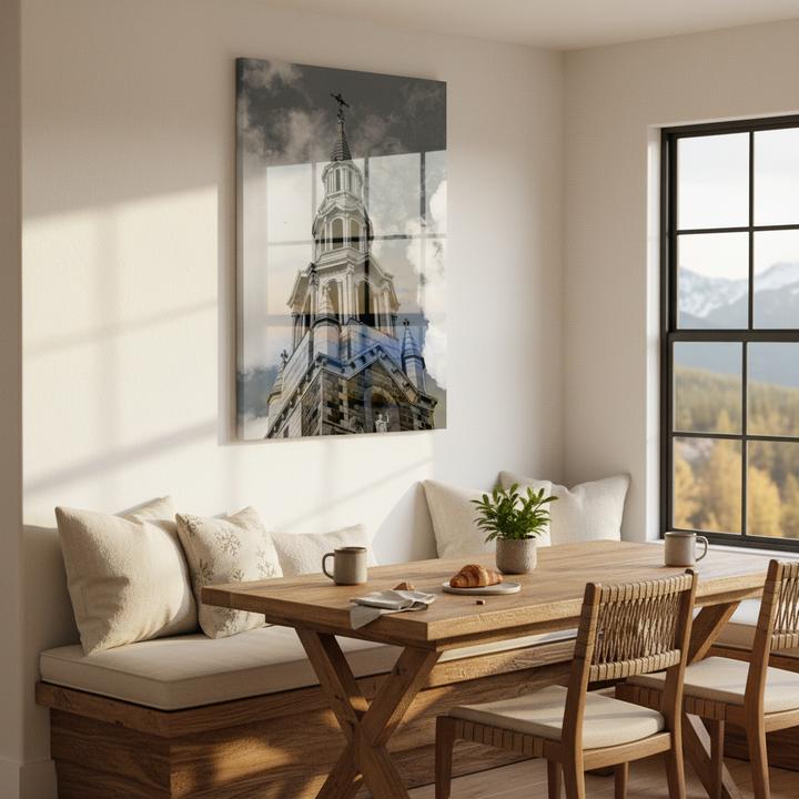 Dining room with wooden table and chairs, large window, and wall art of a church steeple from Studio Shefford
