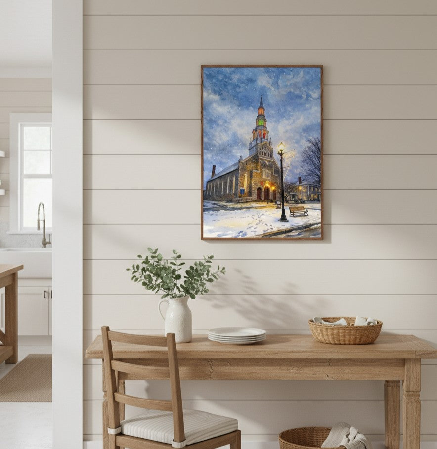 Dining room with a painting of a snowy street scene with a church on the wall - Studio Shefford