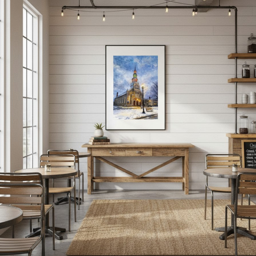 Dining area with wooden table and chairs, framed picture on wall, and shelves.