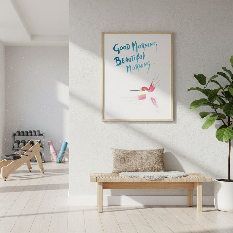 Modern interior with a bench, plant, and framed artwork by Andrew Semple on a white wall - Bromont Media