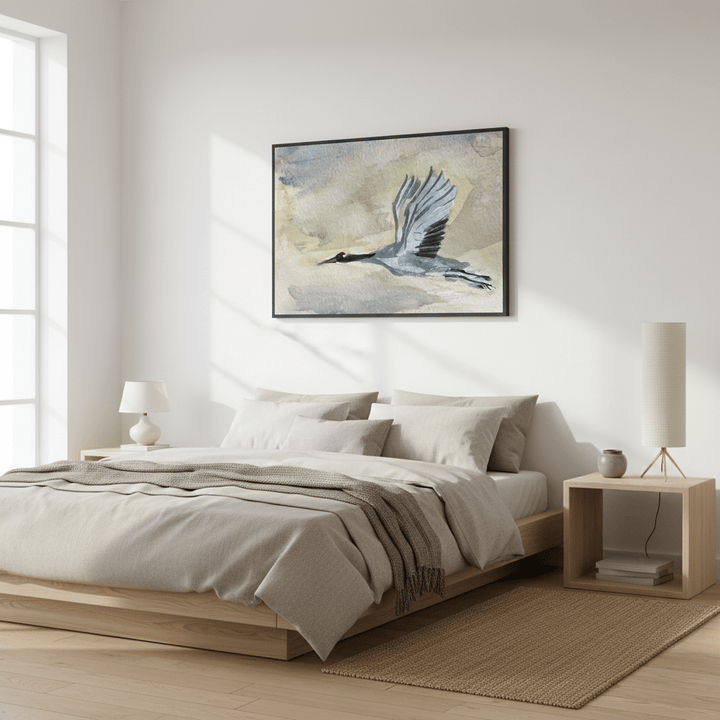 Modern bedroom with a bed, nightstands, and a painting of a bird on the wall - Bromont Media