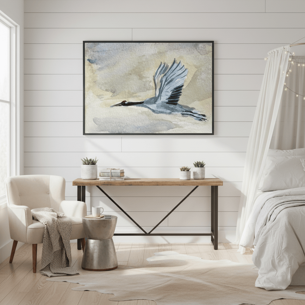 Modern bedroom with a wooden desk, chair, and framed artwork of a Blue Heron - Bromont Media