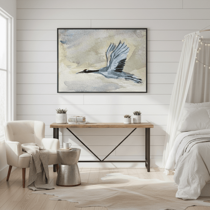 Modern bedroom with a wooden desk, chair, and framed artwork of a Blue Heron - Bromont Media