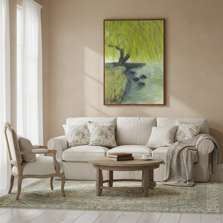 Living room with beige sofa, armchair, and coffee table, featuring a painting of a tree on the wall.