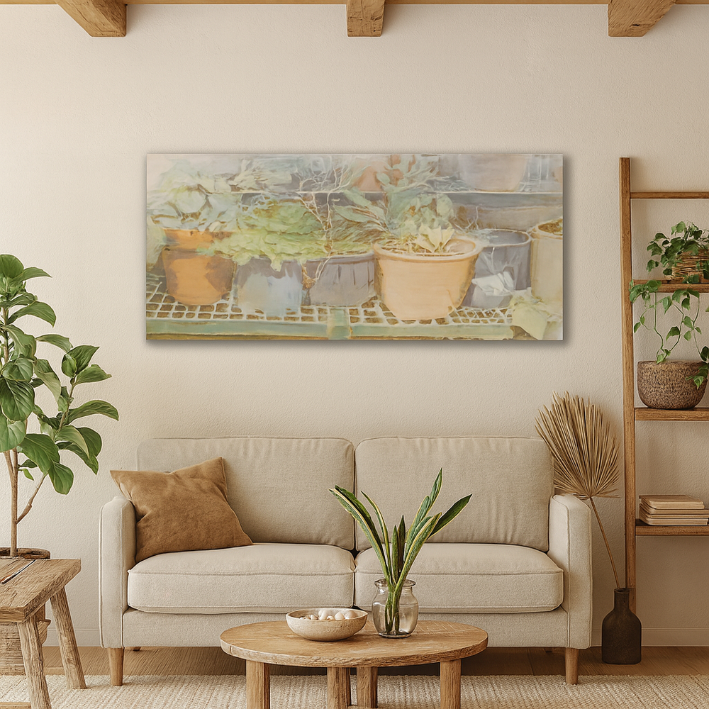 Living room with beige sofa, wooden coffee table, and wall art of potted plants.
