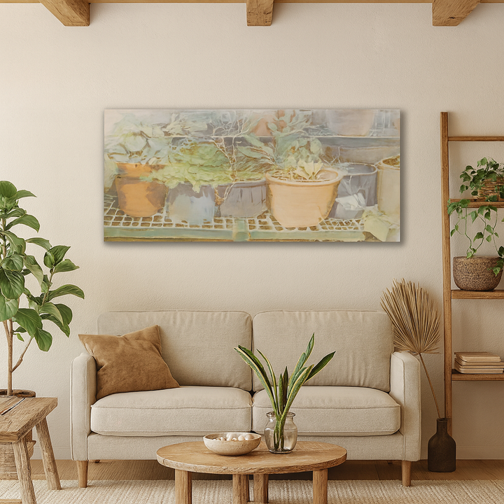 Living room with beige sofa, wooden coffee table, and wall art of potted plants.