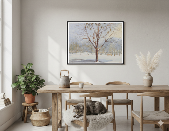 Dining room with wooden table, chairs, a sleeping cat and a framed winter landscape painting on the wall - by Veronique Semple in Bromont Media