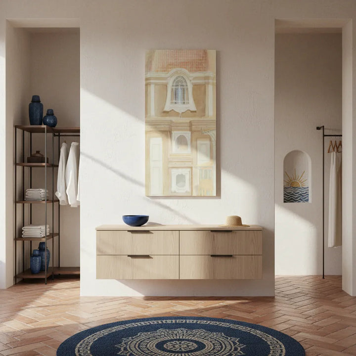 interior with wooden vanity, decorative rug, and wall art of italian architecture
